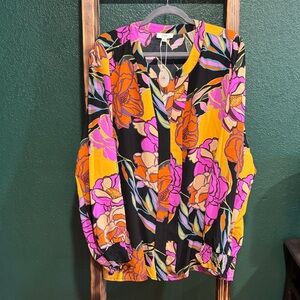 Vibrant Floral Blouse with Bold Colors